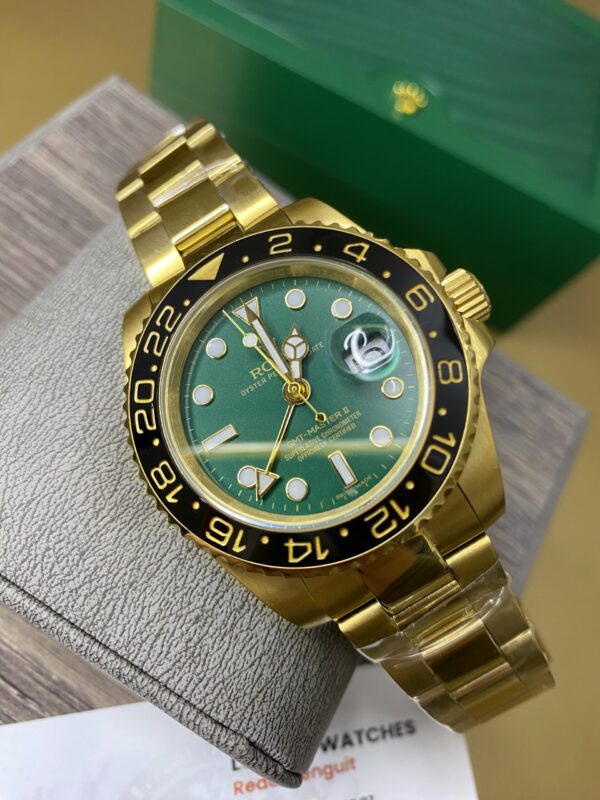 Rolex GMT Master II Gold & Green Dial