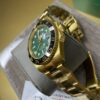 Rolex GMT Master II Gold & Green Dial