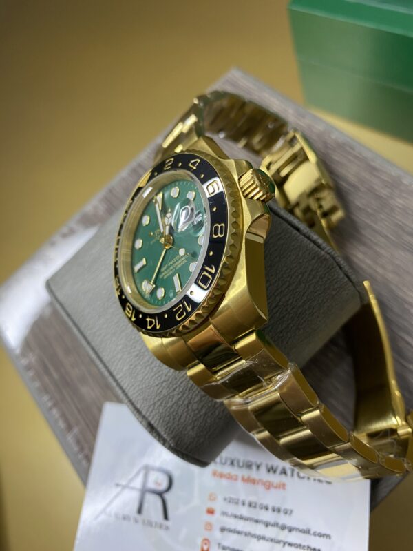 Rolex GMT Master II Gold & Green Dial