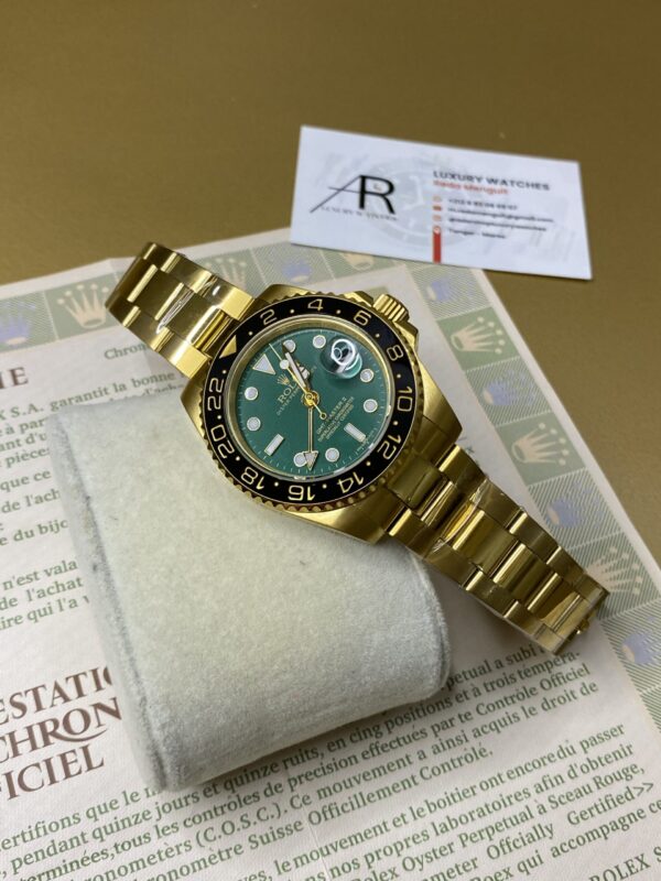 Rolex GMT Master II Gold & Green Dial