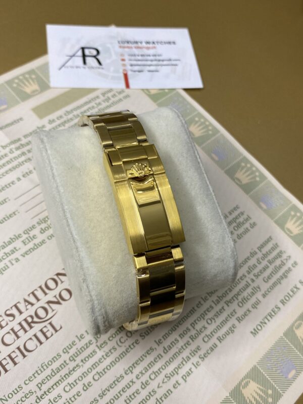 Rolex GMT Master II Gold & Green Dial