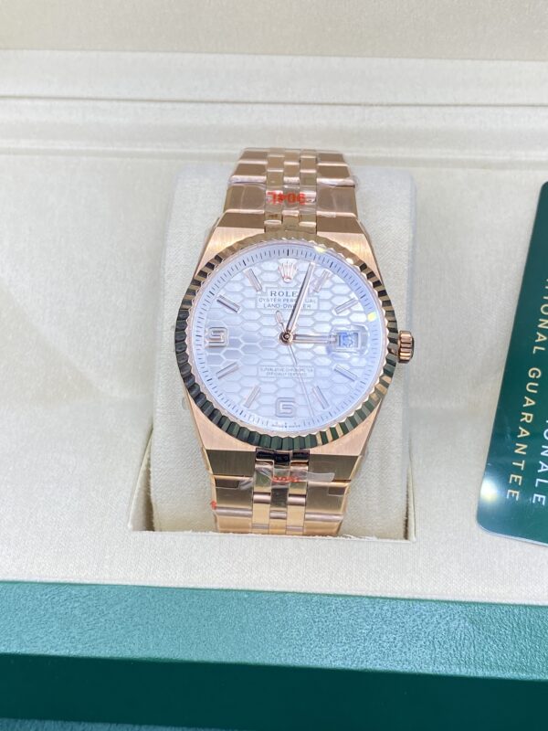 Rolex Date Oyster Perpetual Land-Dweller Rose Gold White Dial 41 mm